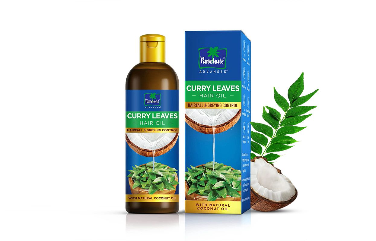 Curry leaves, broken coconut with Parachute Advansed Curry Leaves Hair Oil