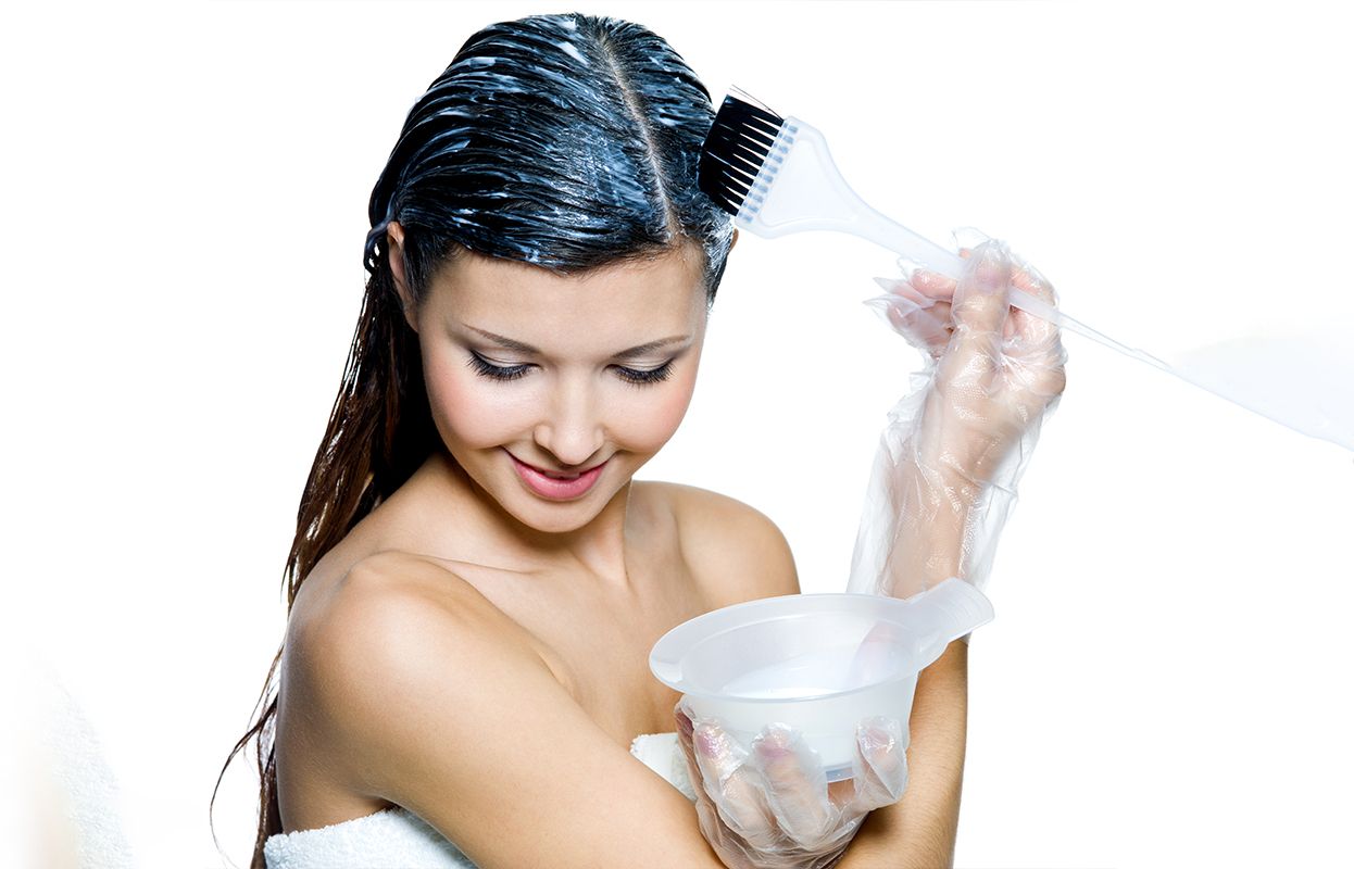 A woman with a bowl of hair mask