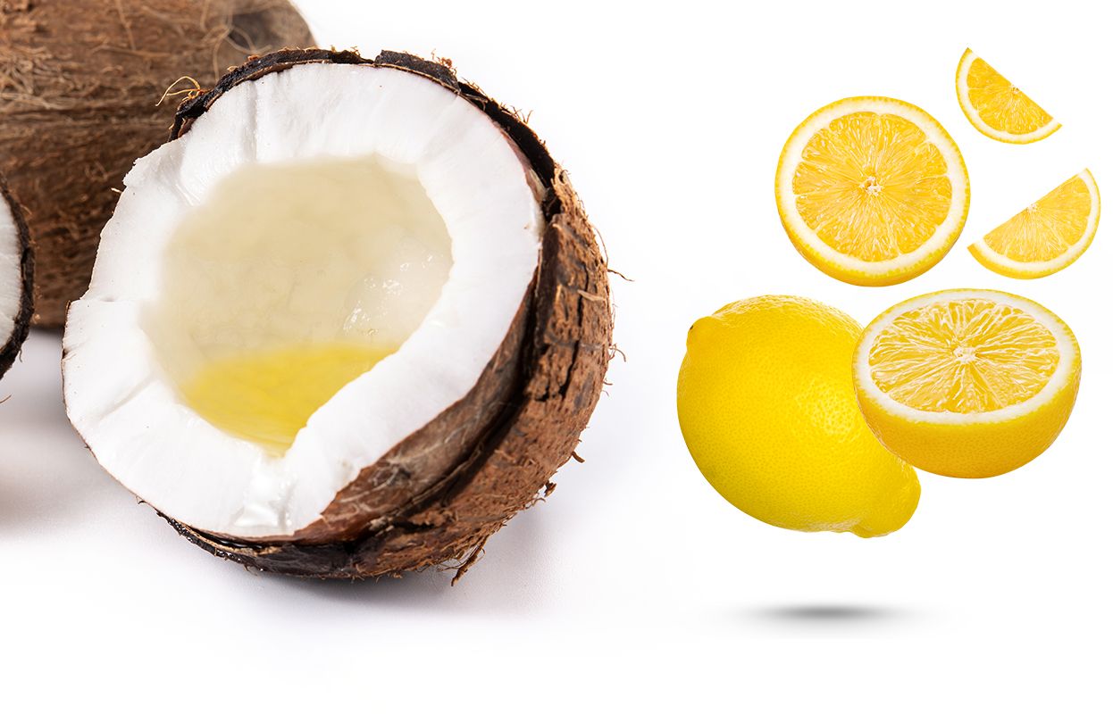 Coconut based hair oil with cut lemons