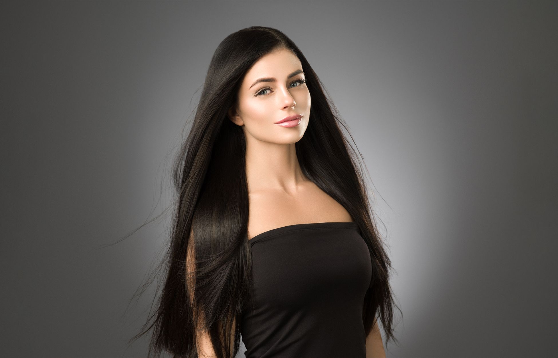 a woman with long, lustrous hair