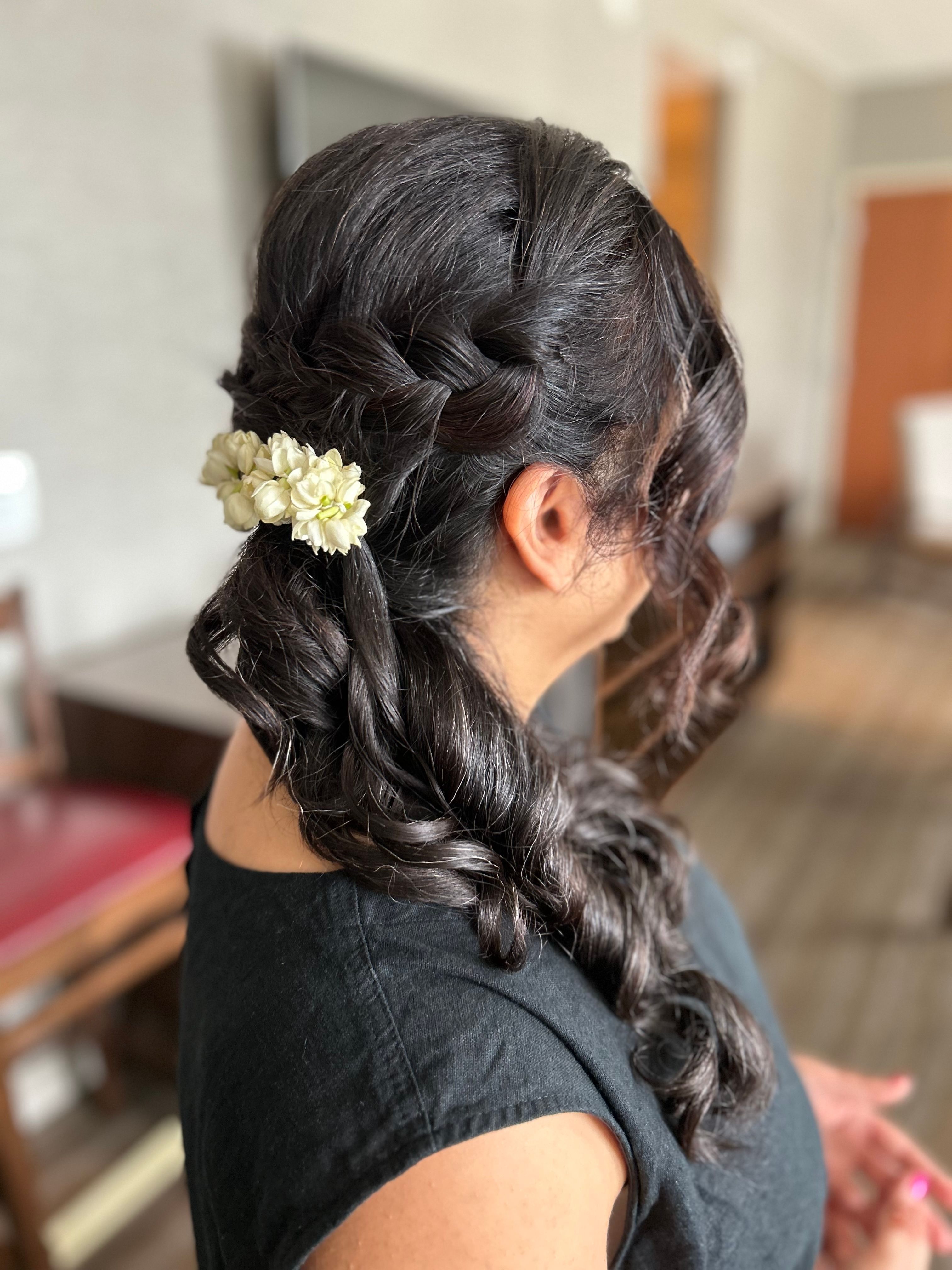 Side Braid with Jasmine Flowers Hairstyle