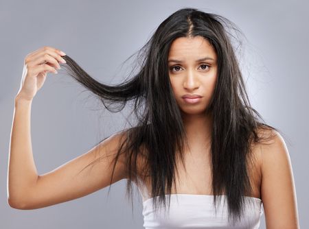 Girl concerned about her rough hair