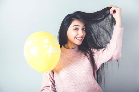 Girl with thick bouncy hair