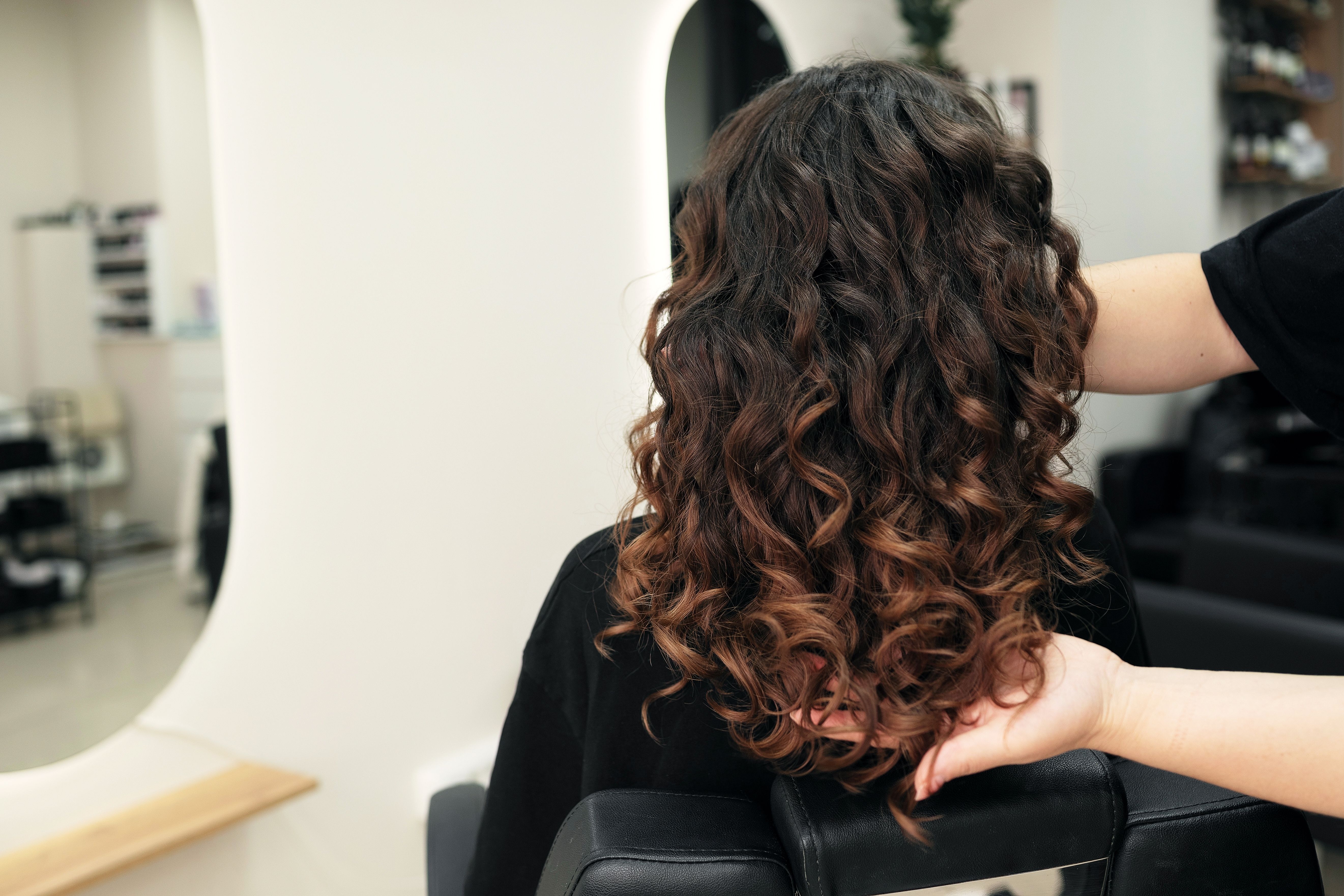 Girl with thick curly bouncy hair
