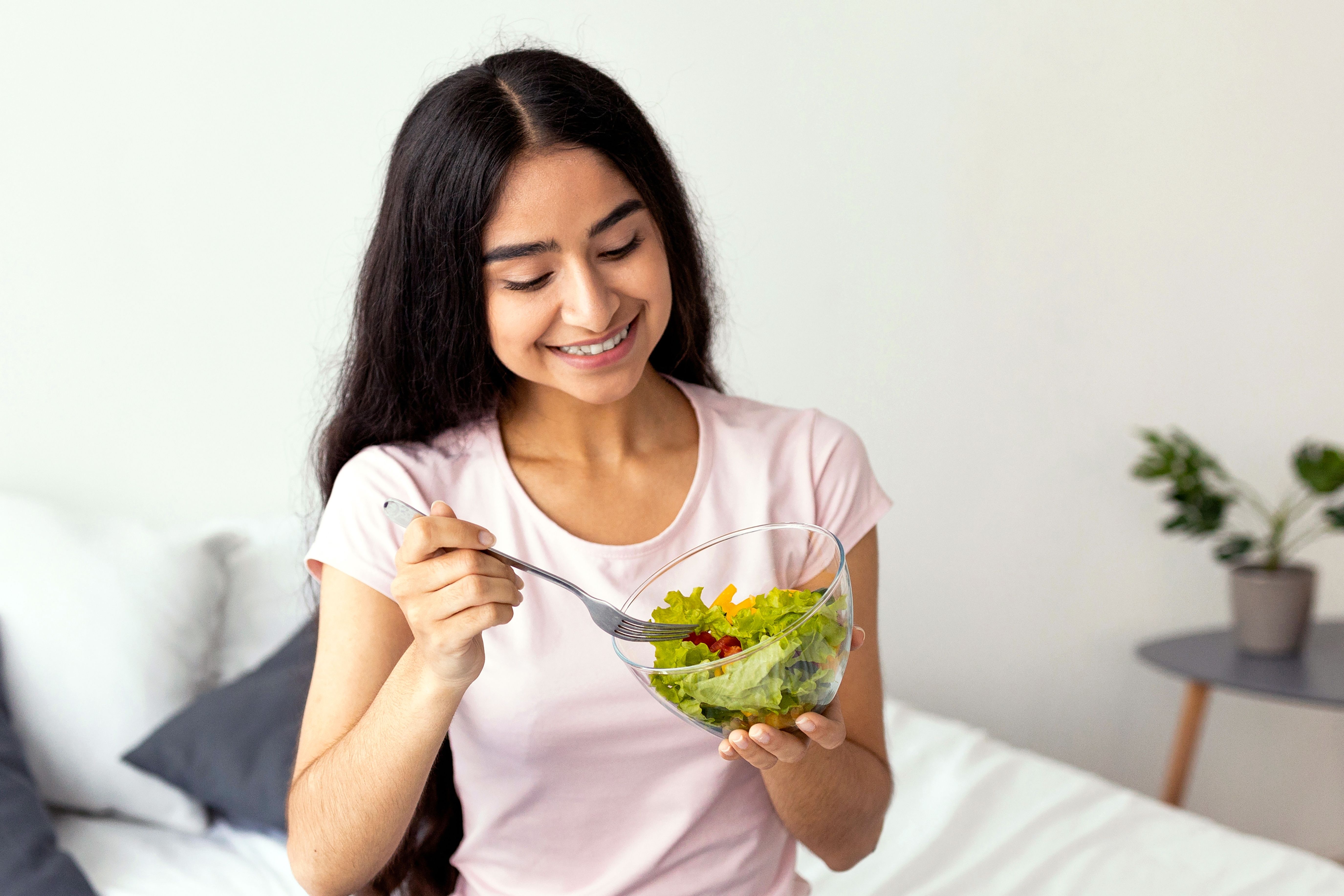 Girl eating healthy foods for hair growth