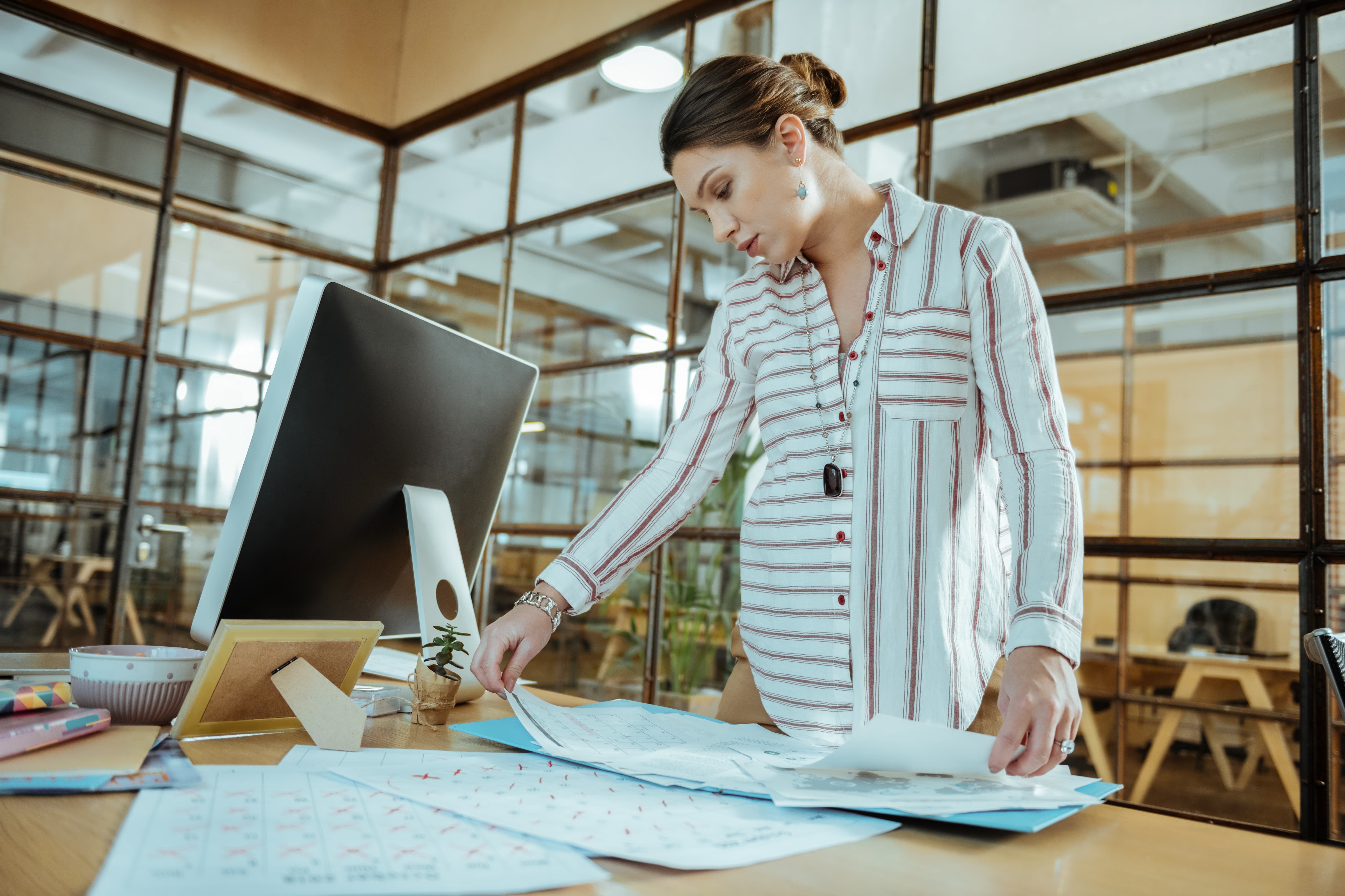 Centre-Parted Sleek Low Bun hairstyle