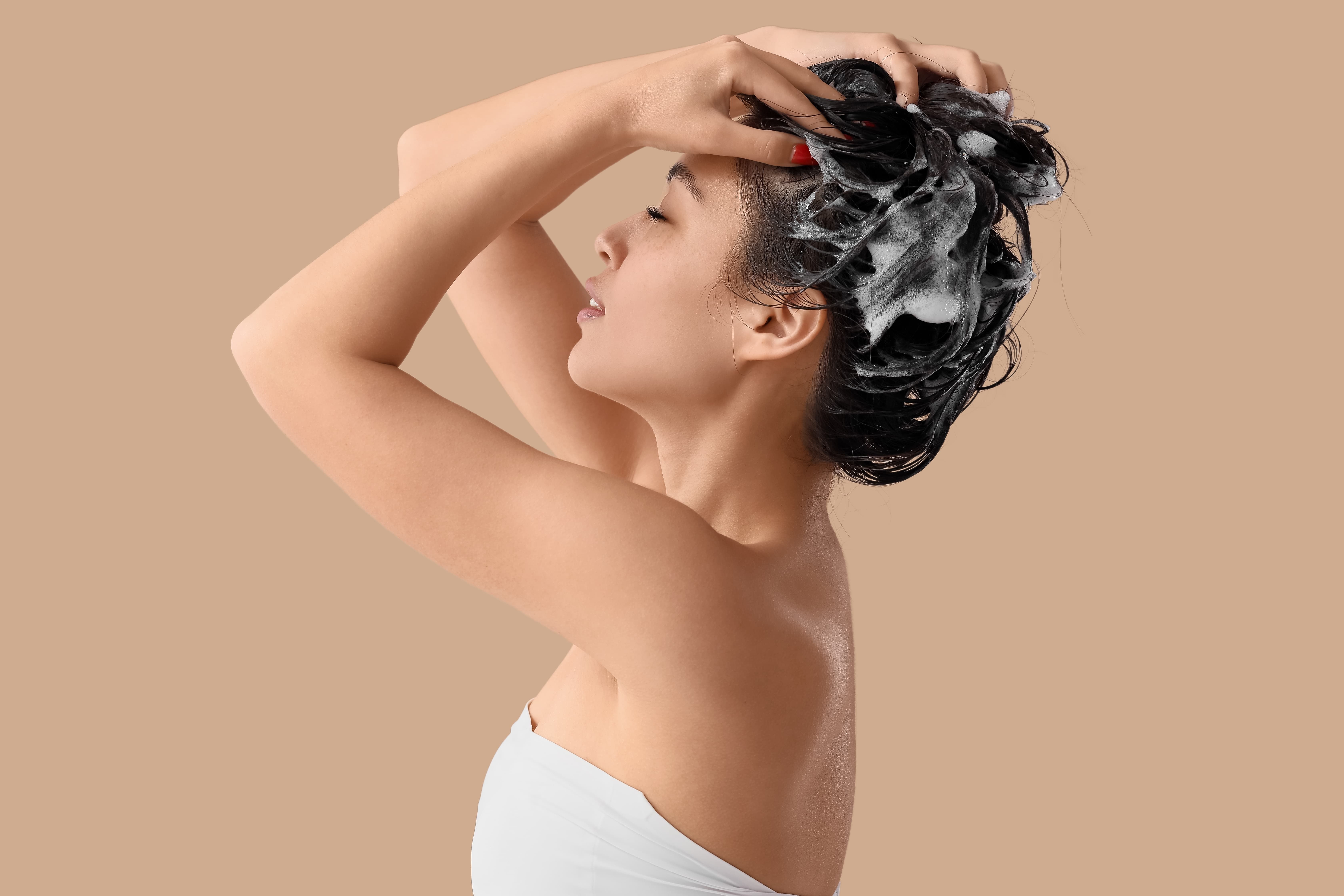  Girl using gentle shampoo on her hair