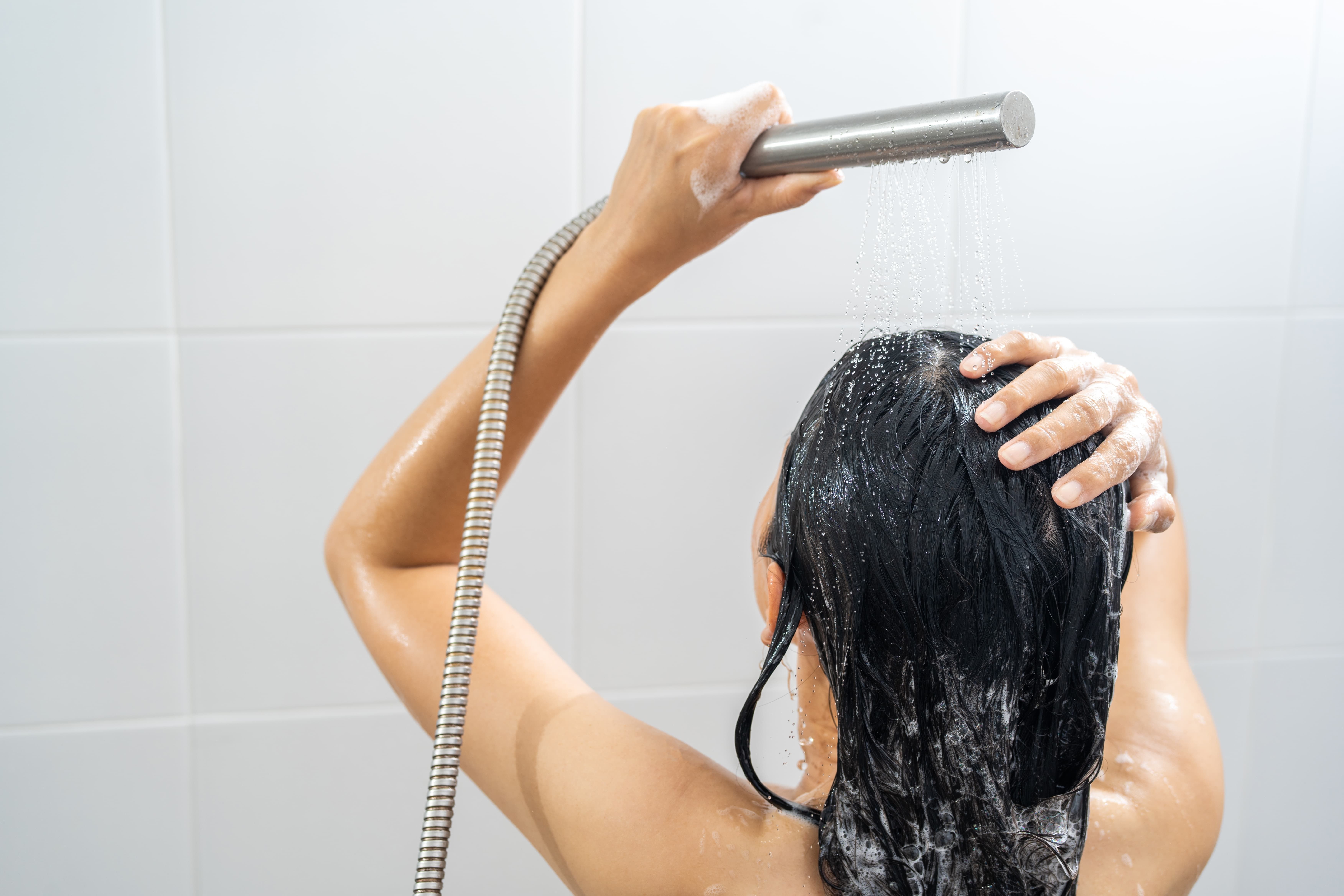 Girl washing her hair
