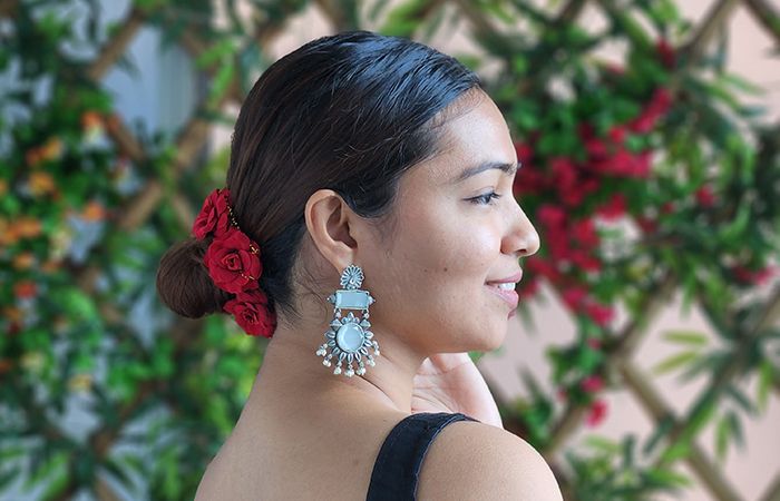 Tight Bun Embellished with Flowers style