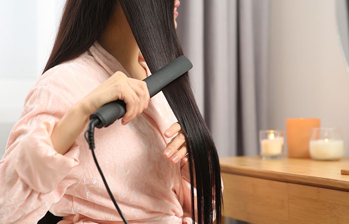 Girl Using Hair Styling tool