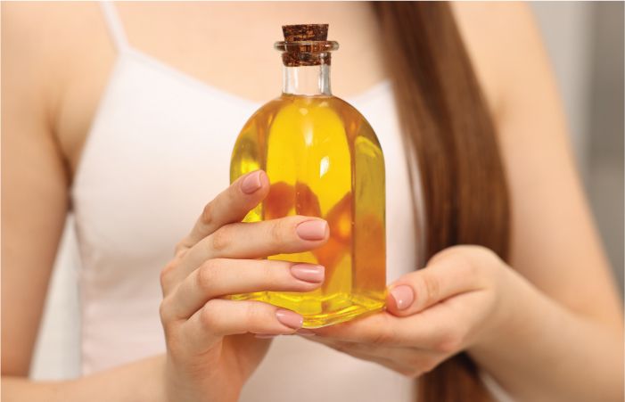 Jar filled with Hair Oil