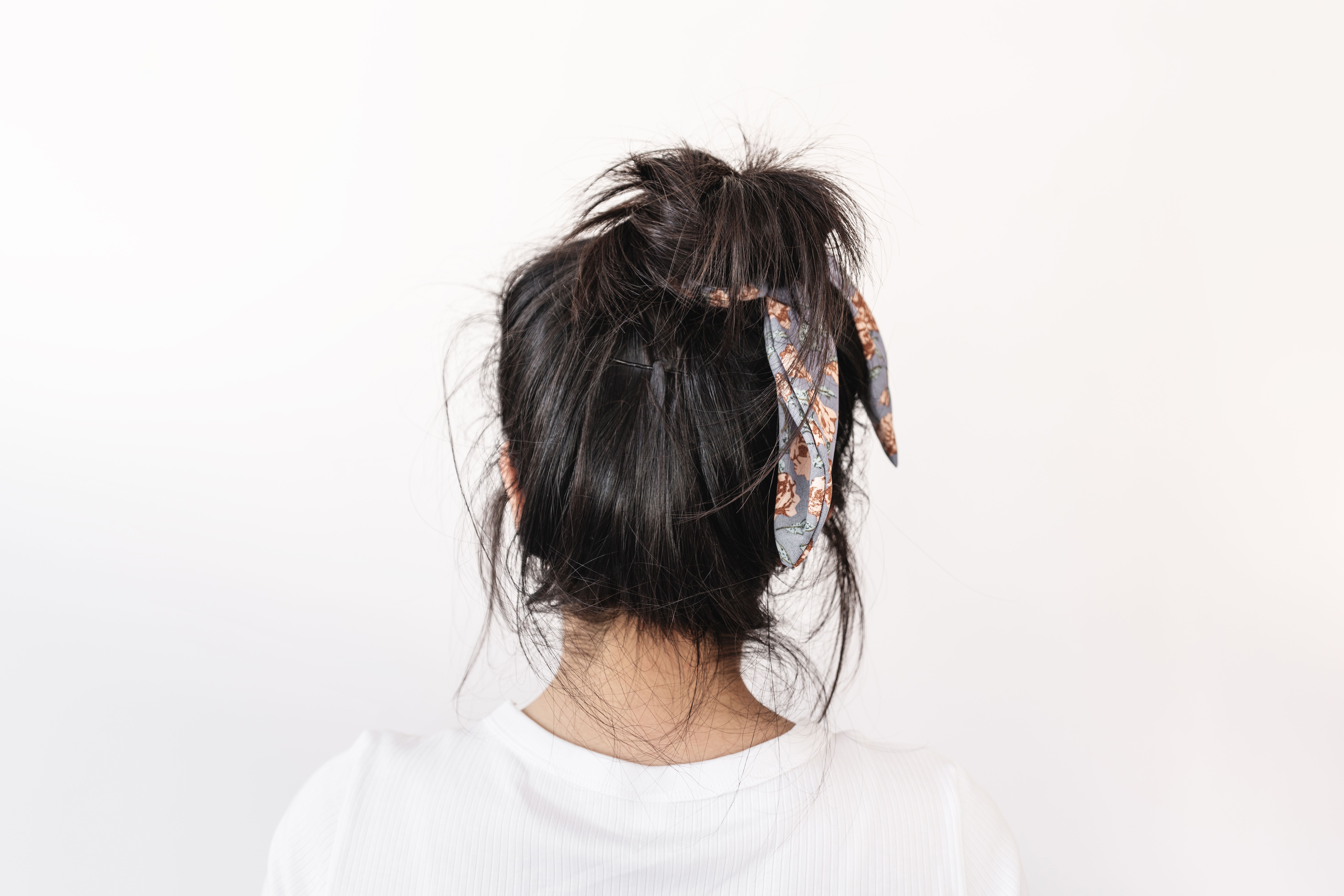 Messy High Bun Hairstyle